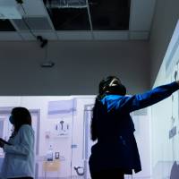 Student exploring learning tools